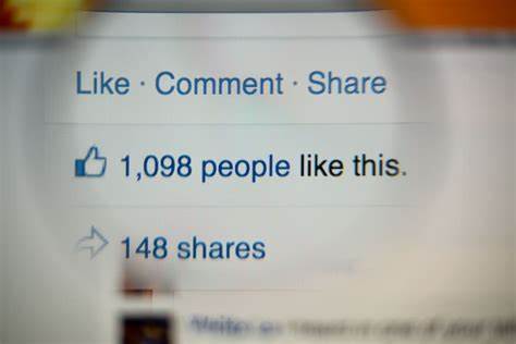 An image of Facebook likes, comment and share being displayed
